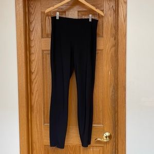 Theory fitted suit pants with outside leg zip detail.